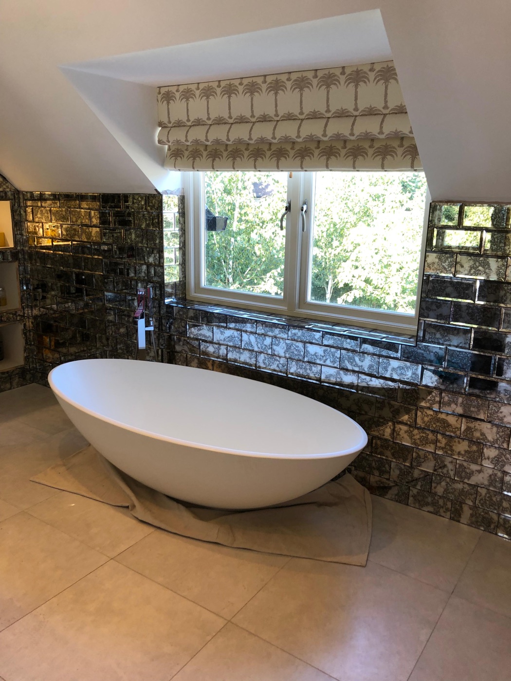 Luxury bathroom tiling with antique mirror tiles and freestanding bath, Bromley — Bromley Tiler