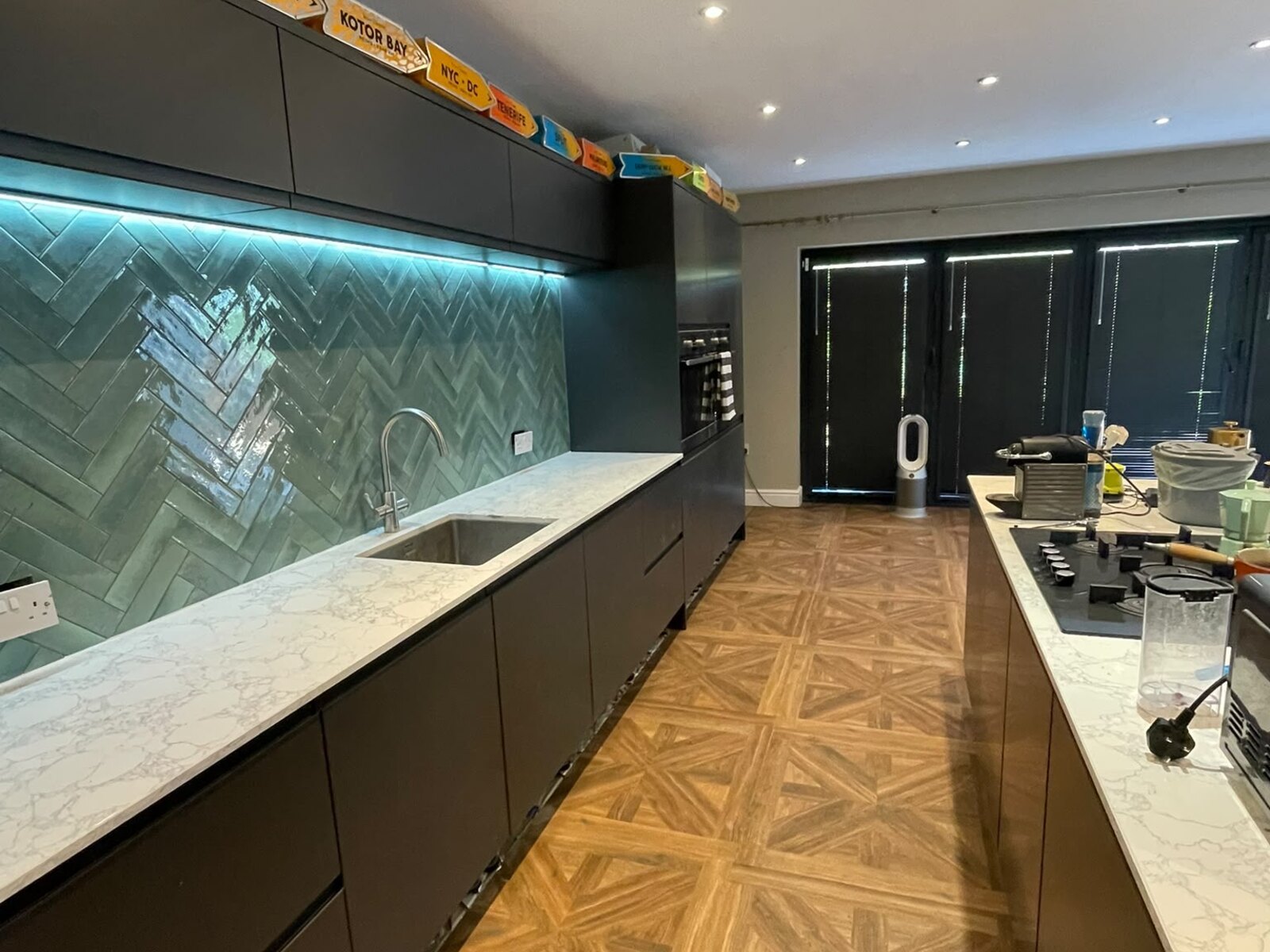 The finished wood-effect parquet porcelain kitchen floor, Orpington