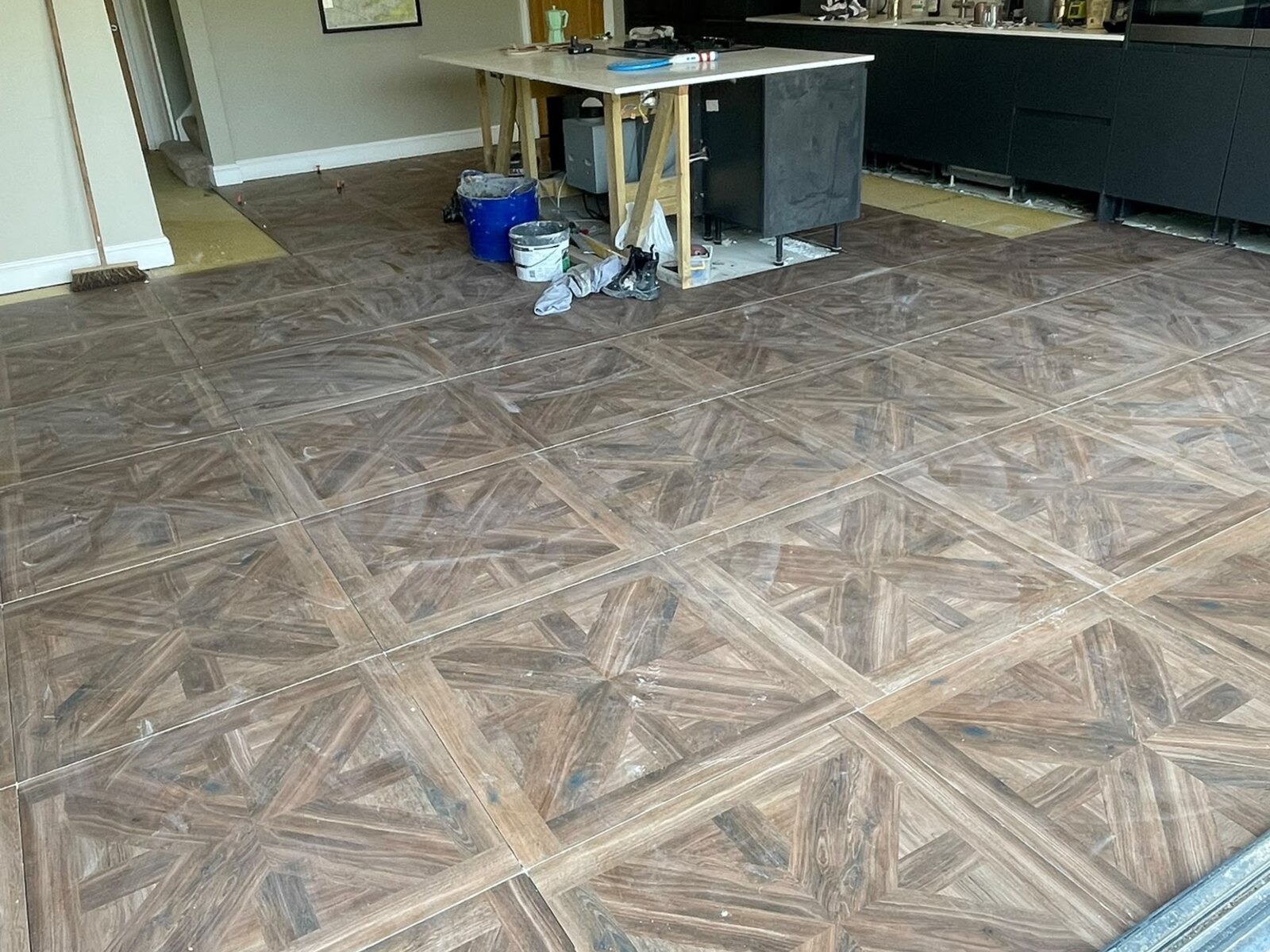 Close detail of wood-effect parquet porcelain tiling pattern, Orpington, Bromley Tiler
