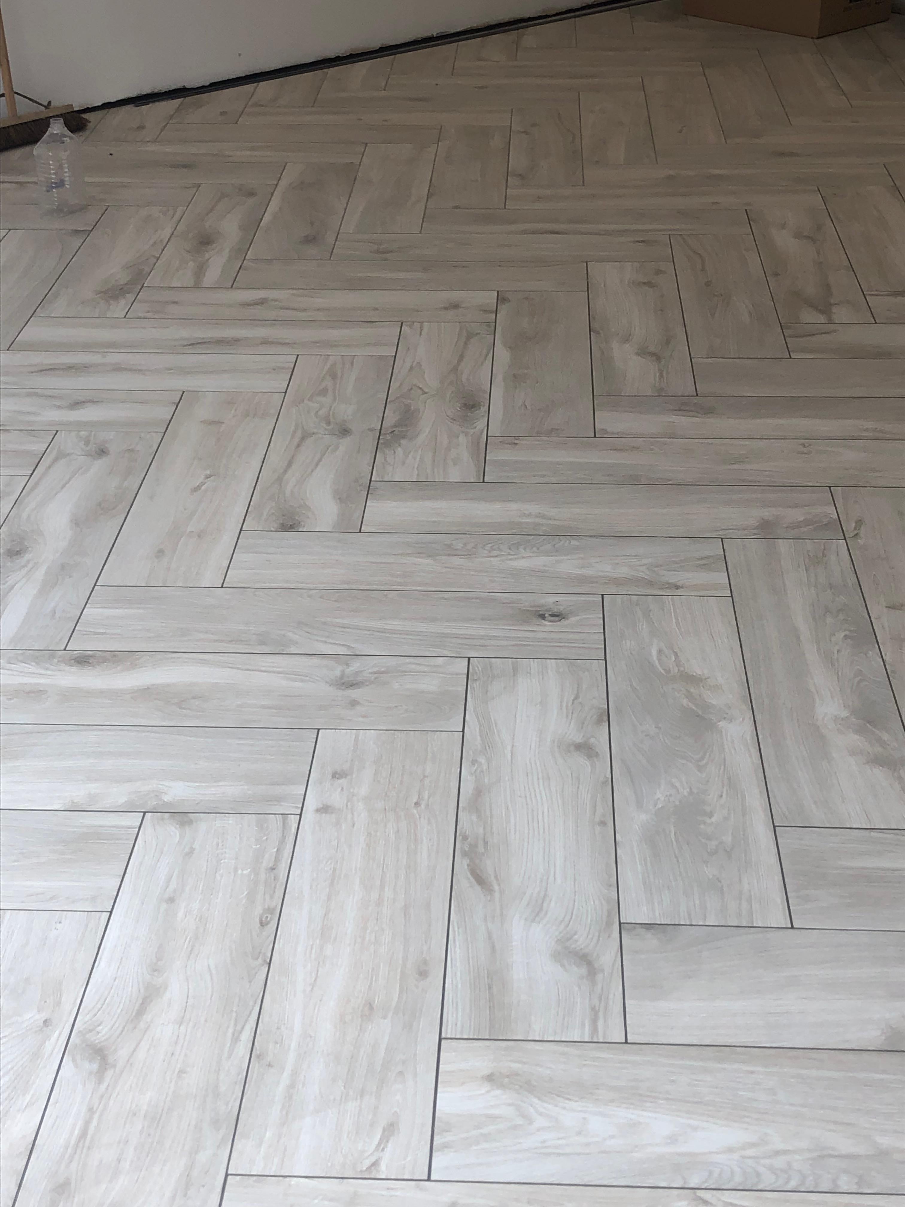 Kitchen Floor Tiling in Orpington — Grey wood-effect herringbone floor tiles in open plan kitchen extension, Orpington — Bromley Tiler