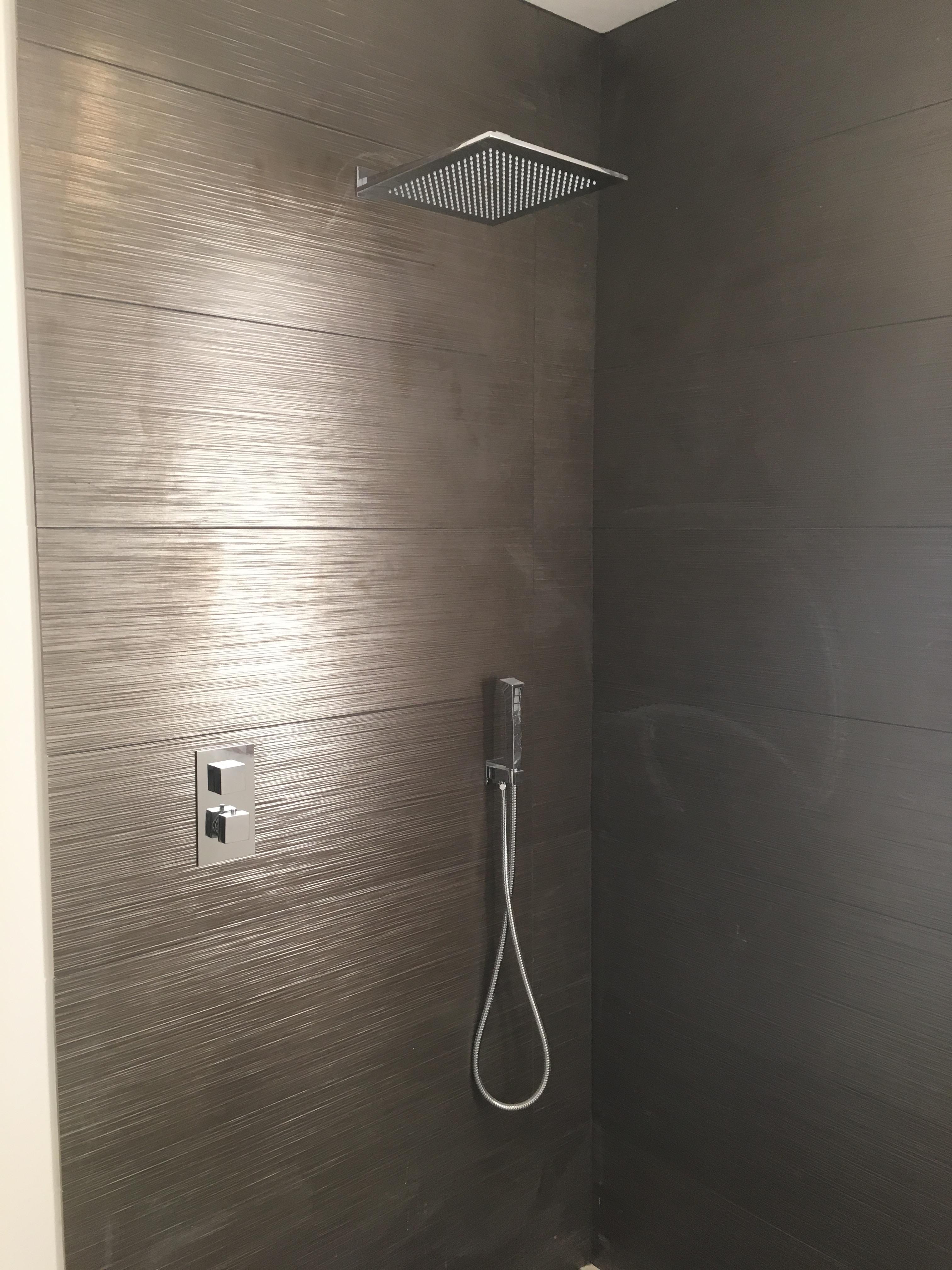 Porcelain Tiling in Penge, Espresso wood-effect porcelain tiling in a shower enclosure, Petts Wood, Bromley Tiler
