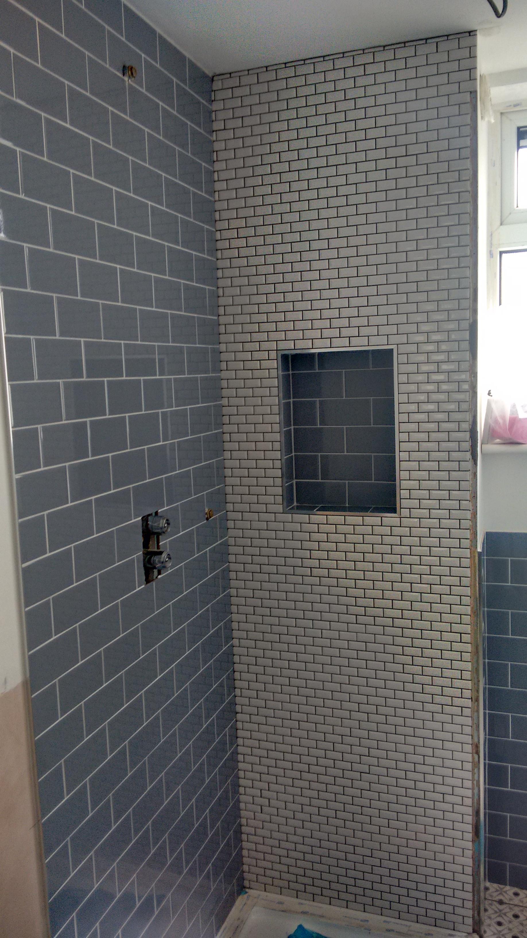 Precision grey metro tiling with crisp grout lines and neat cuts, Bromley Tiler