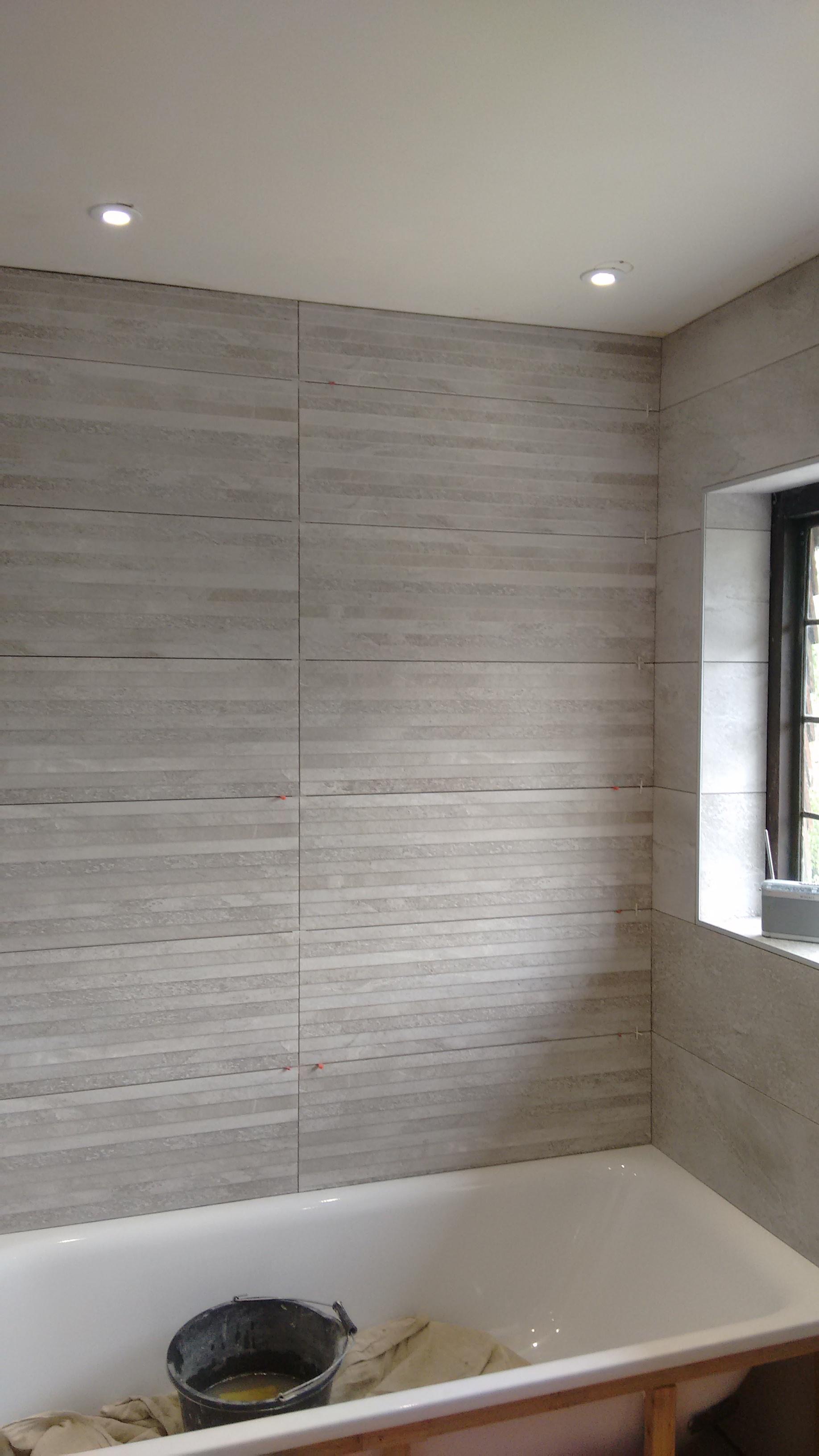 Porcelain Tiling in Orpington — Large format grey stone-effect wall tiles in bathroom, Eltham — Bromley Tiler