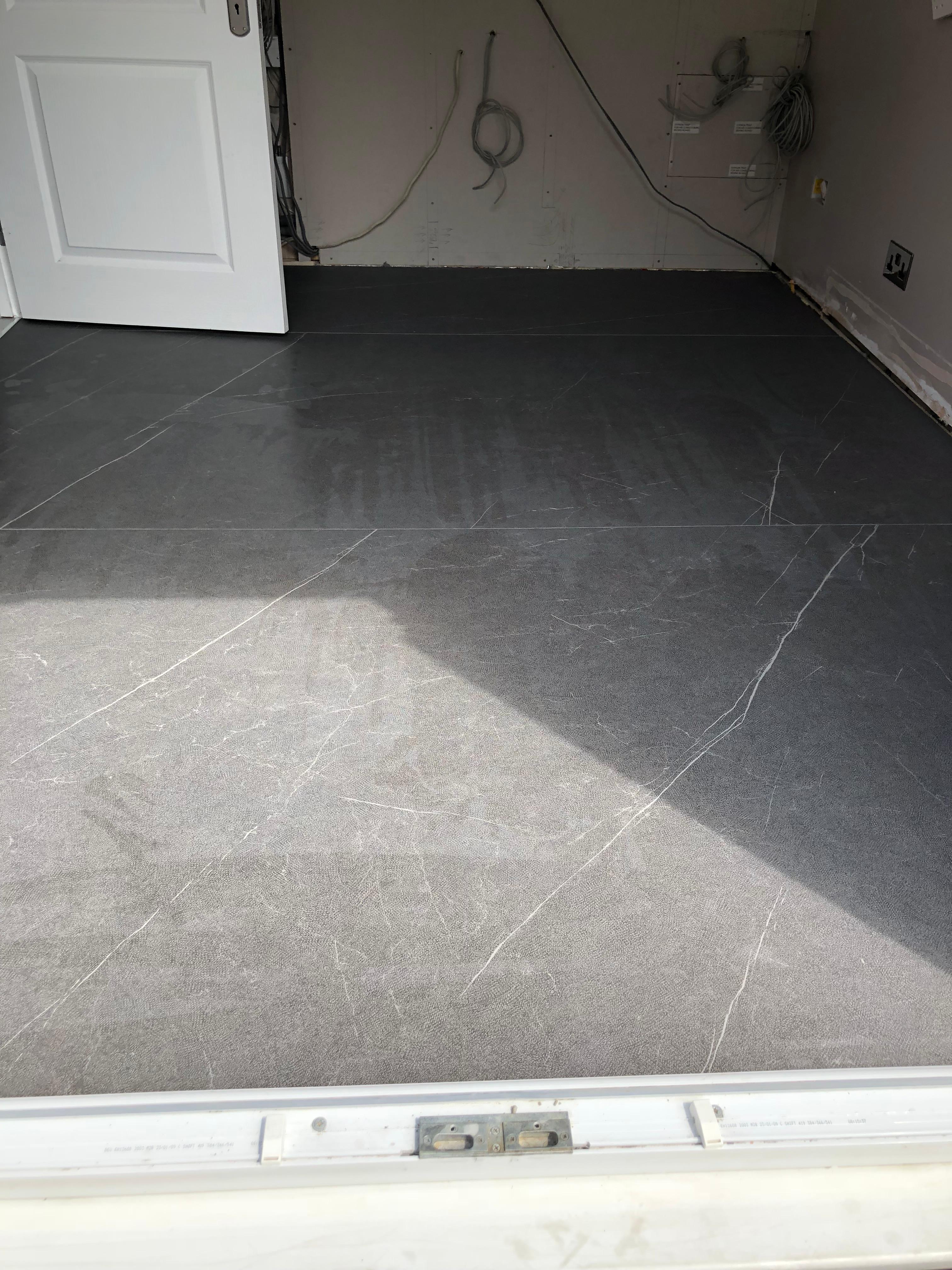 Underfloor Heating in Sydenham, Dark charcoal large format porcelain floor tiles in a kitchen, Sidcup, Bromley Tiler